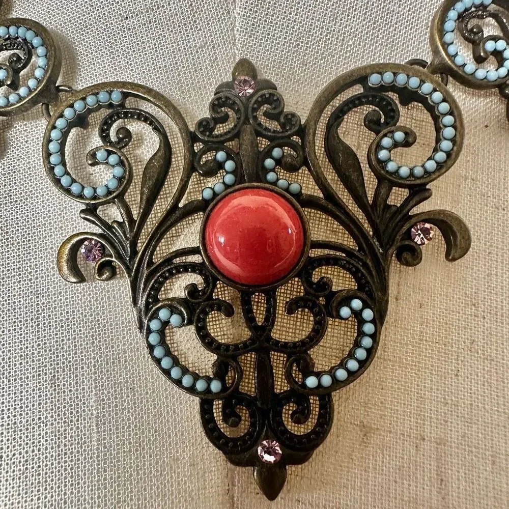 Plunder copper tone orange blue statement necklace